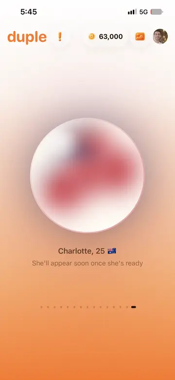 Duple on iPhone: a blurred portrait while a new companion named Charlotte, 25, is generated, with the text She will appear soon once she is ready.